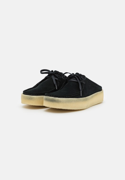 Vaso Clarks Wallabee Negro Zuecos