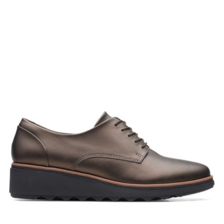 Sharon Noel Marrón Antiguo Clarks